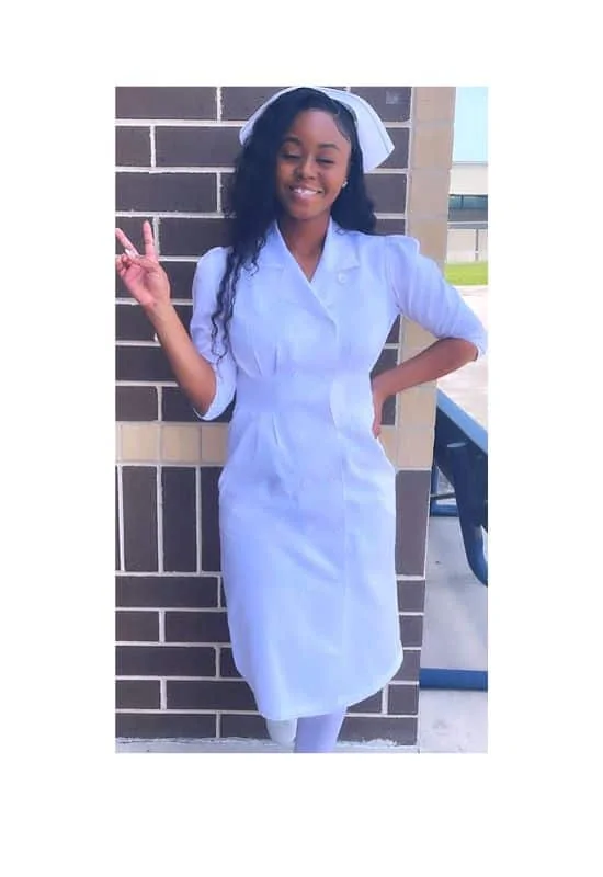 White scrub dress for nursing pinning ceremony