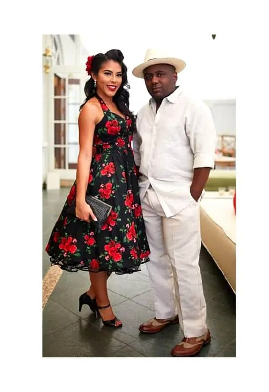 Vintage rose dress and white sleek suit cuban party