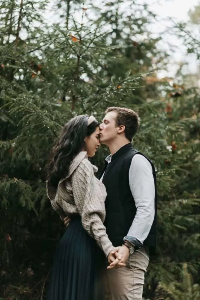 Winter couple photoshoot with trees