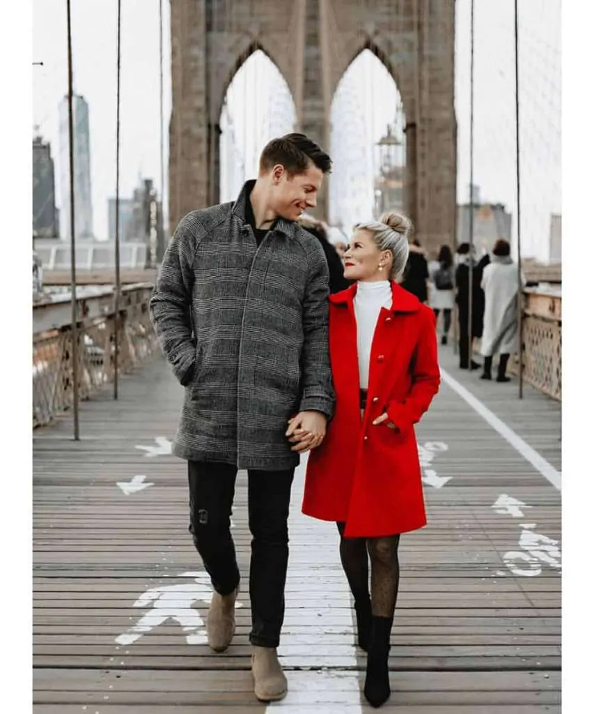 winter engagement photoshoot on a bridge
