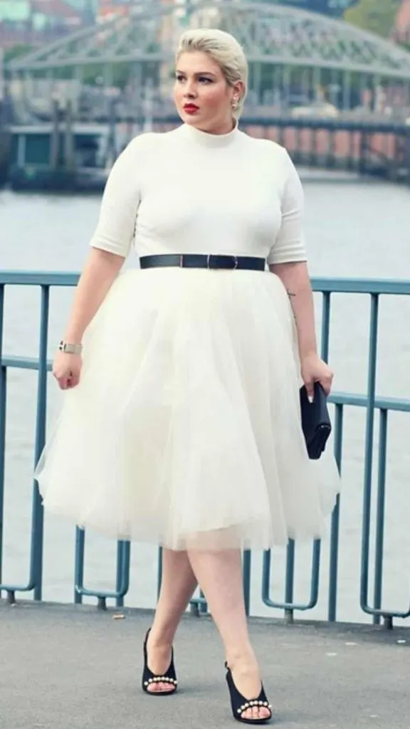 white turtleneck top and white tulle skirt plus size