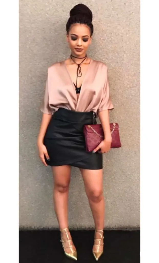 satin shirt and leather skirt outfit