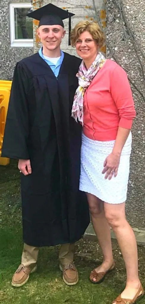 floral scarf and pink cardigan mother outfit