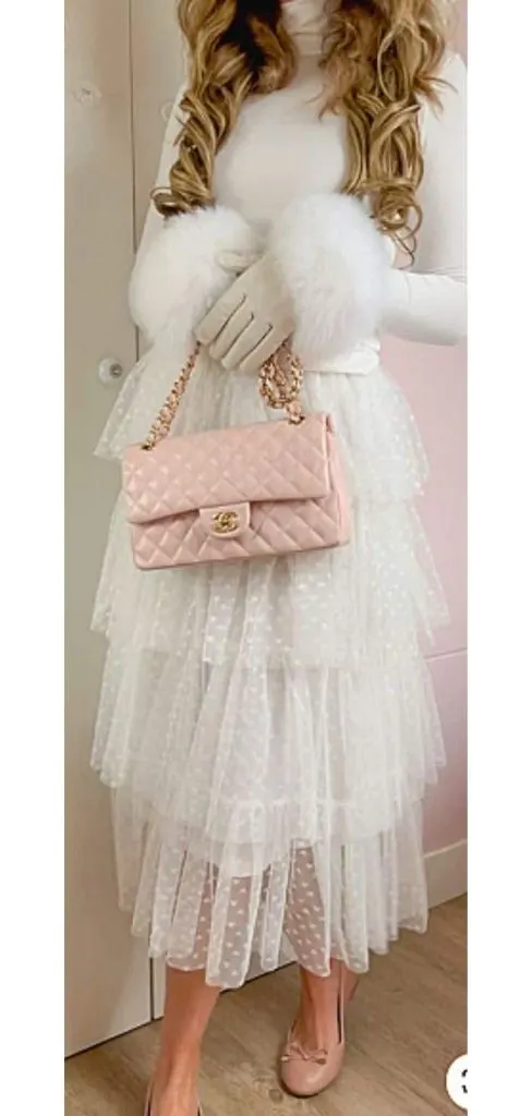 white winter and pink chanel bag wonderland outfit