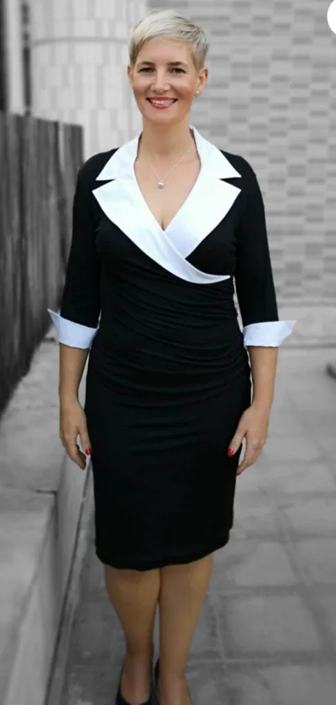 Black wrap dress with white trim