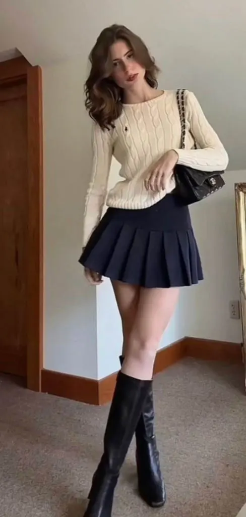 short pleated skirt and cream knit wear