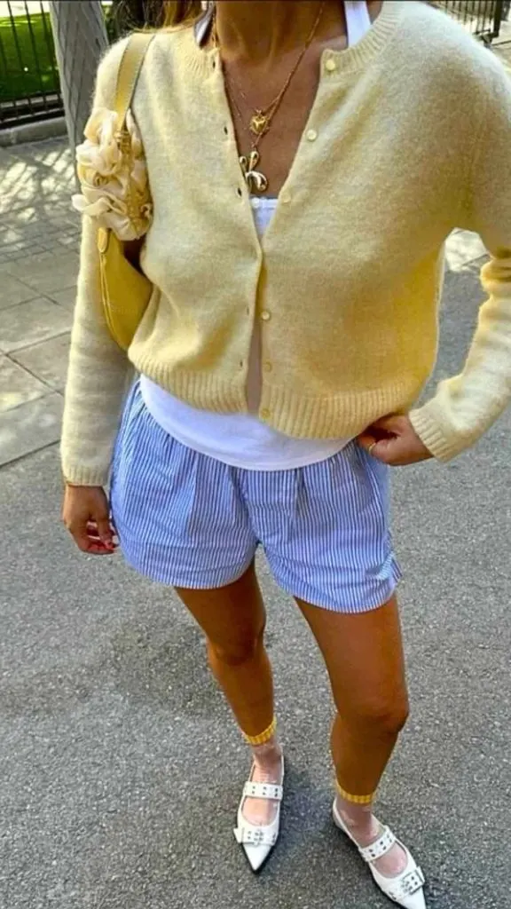yellow cardigan and boxer shorts