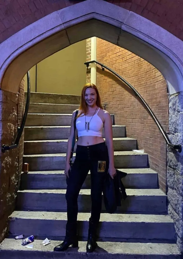 white crop top black pants concert outfits