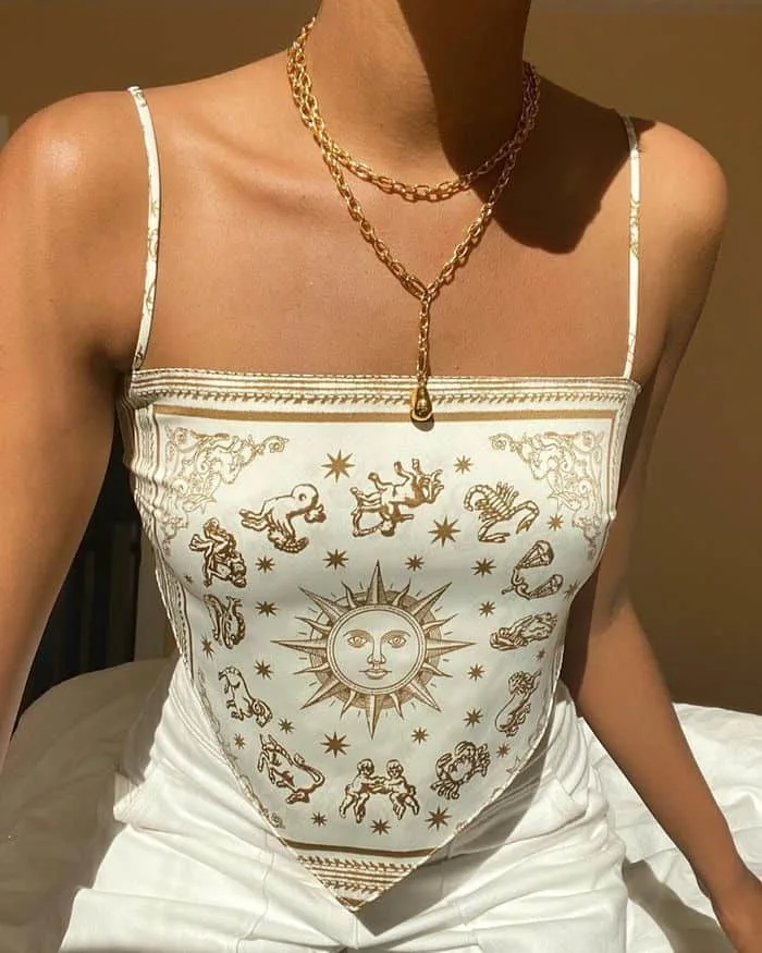 white and gold top