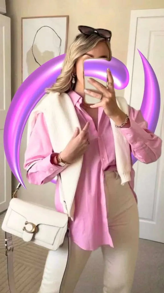 shirt and cardigan drape over shoulder