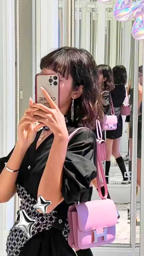 Hermes pink Constance bag outfit