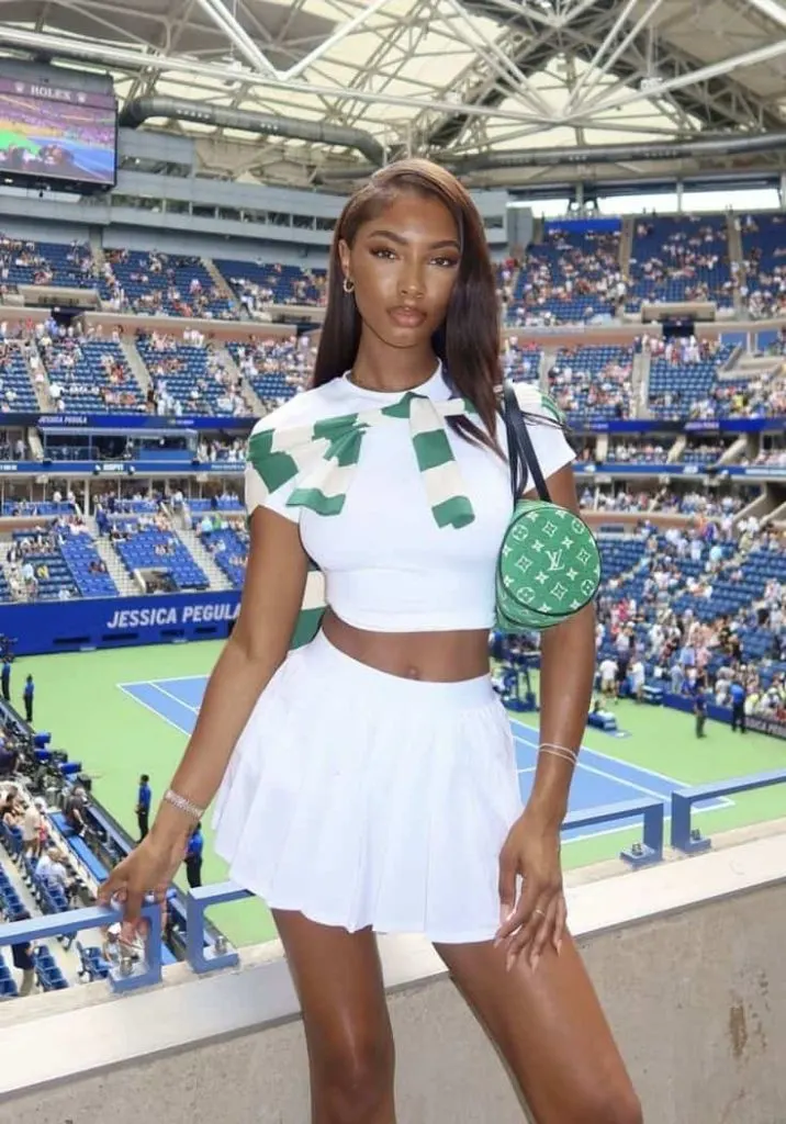 US open white polo and skirt