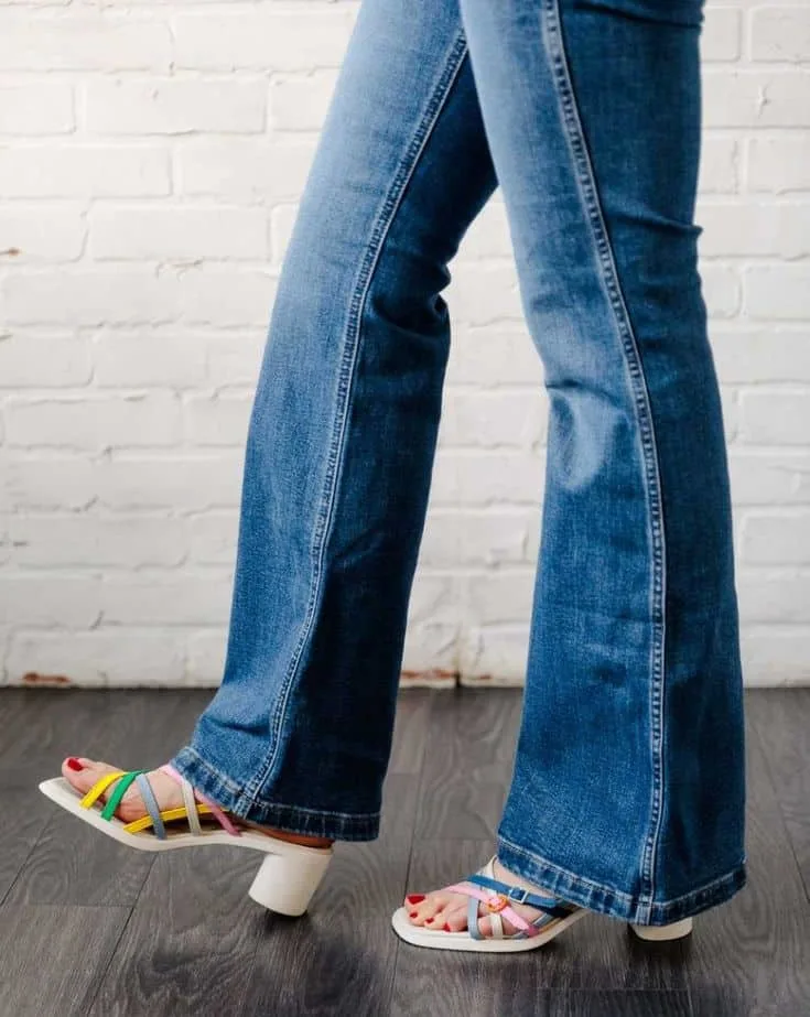 flared jeans and sandals