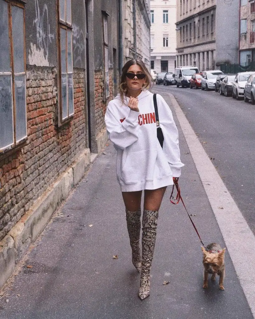 HOODIE AND SNAKE PRINT BOOTS
