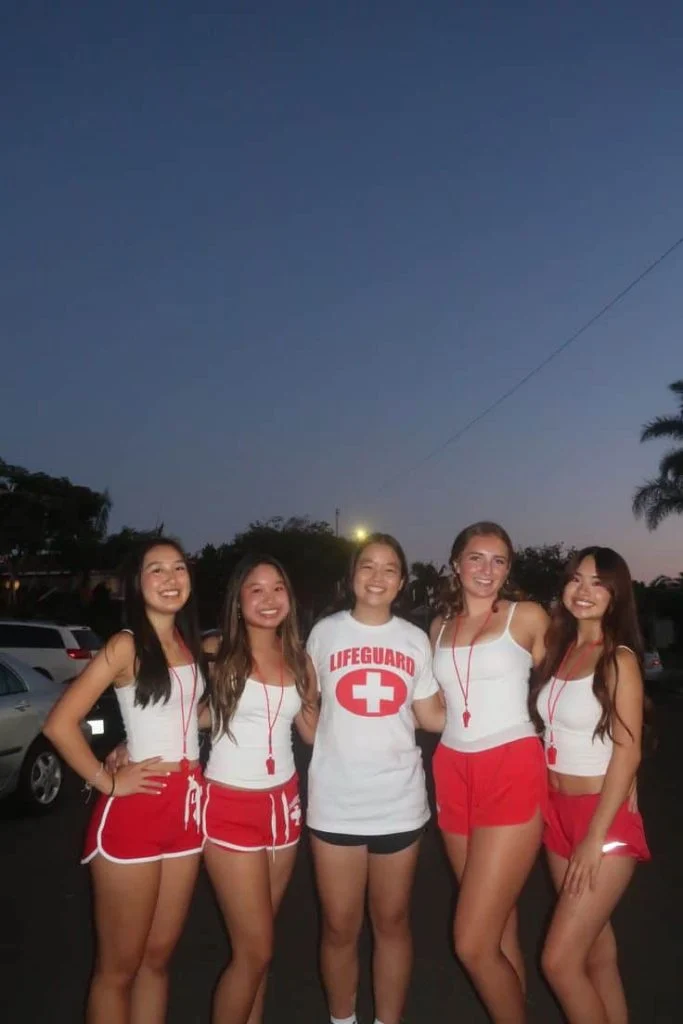 BAywatch themed party outfits couple