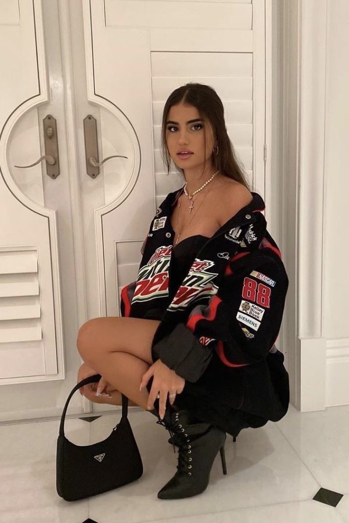 racing jacket outfit aesthetic with black dress