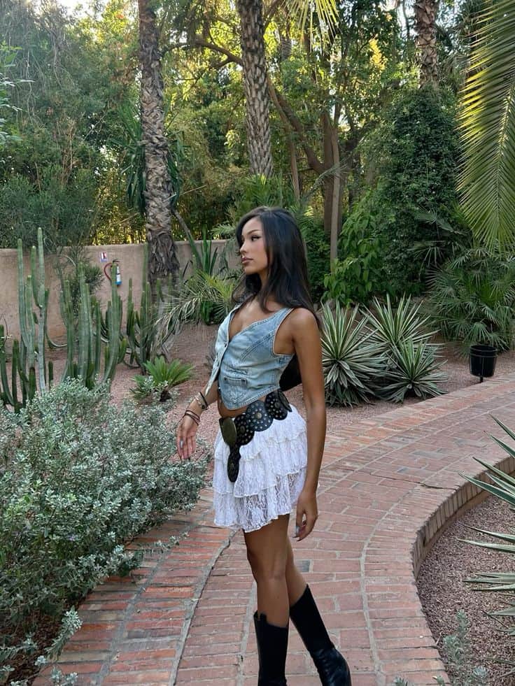 denim vest and white ruffle skirt outfit